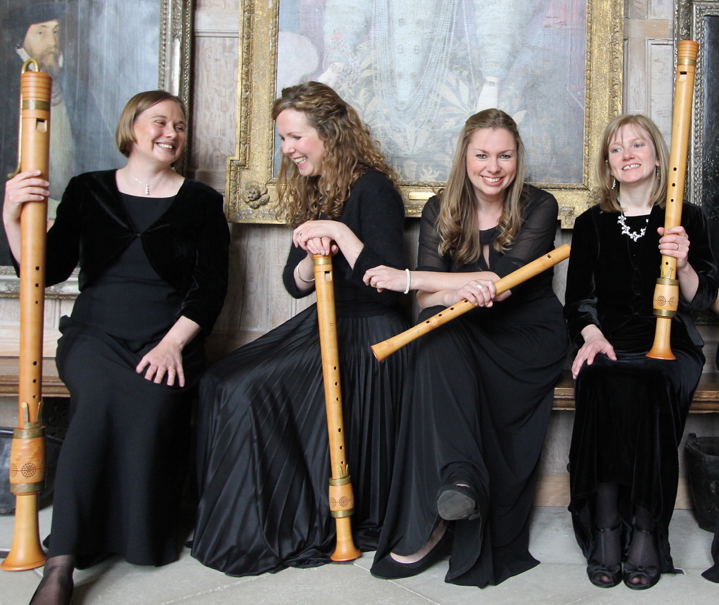 4 members of Fontanella sitting in historical palace, holding consort recorders
